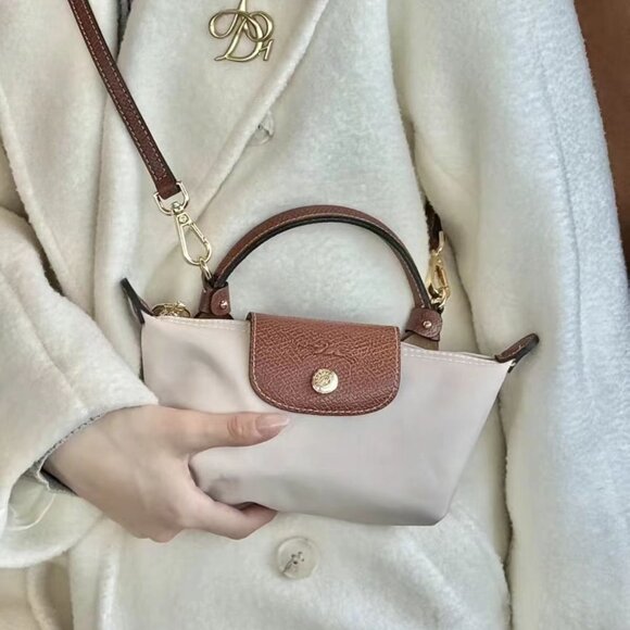 Longchamp Handbags - Longchamp Burgundy and Tan Cosmetic Bag